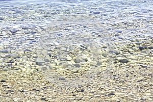 Boulders under transparent waters