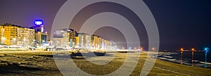 The boulevard and beach of blankenberge lighted at night, popular and touristic location in Belgium, city architecture illuminated