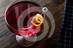 Boulevardier cocktail with lemon peel.