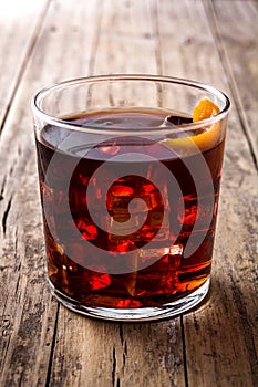 Boulevardier cocktail on wooden table