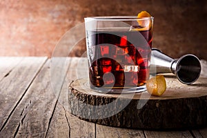 Boulevardier cocktail on wooden table