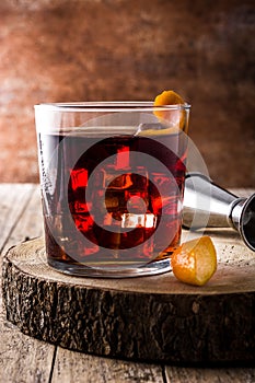 Boulevardier cocktail on wooden table