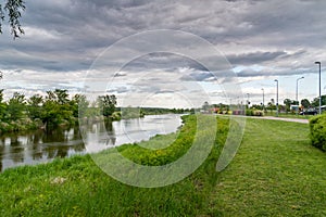 Boulevards on Narew river in the evening in Lomza