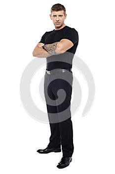 Bouncer with tattoo on hand posing photo