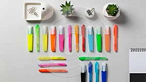 Bound notebook is partially visible on the right edge of the image