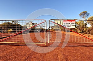 Boundary gate and road with closed sign