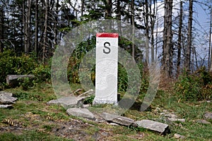 Boundary marker is marking border and borderline to Slovakia, foreign country and state