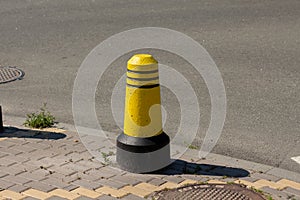 Boundary posts on the sidewalk