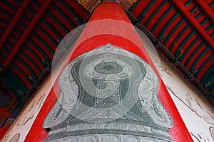 Boundary stone on pole in Chinese temple