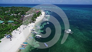 Bounty Beaches and Malapascua Island Seashore in Cebu, Philippines. Sulu Sea, Boats and Beautiful Seascape in Background