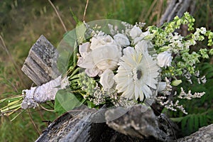 Bouquet of Assorted White Flowers Including Gerber Daisies, Roses, Peonies on Split Rail Fence