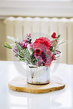 Bouquet of autumn flowers with dahlias and chrysanthemums pink and red color for home decor