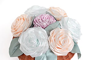 Bouquet, basket of flowers kanzashi from satin ribbons. Japanese traditional handmade decorations, pastel colors