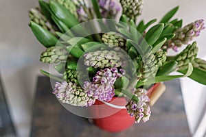 Bouquet of Beautiful lilac hyacinths. Close-up spring flowers in vase. bulbous plant. Floral wallpaper