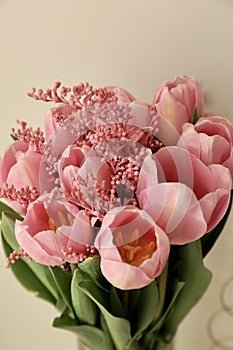 Bouquet of beautiful pink tulips in early spring as a postcard or picture with nice flowers