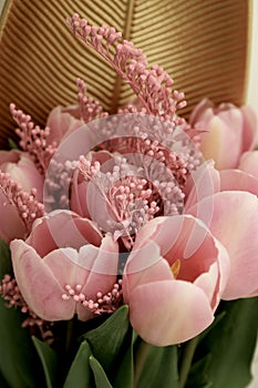 Bouquet of beautiful pink tulips in early spring as a postcard or picture with nice flowers