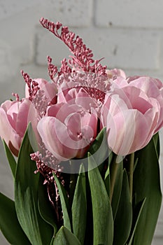 Bouquet of beautiful pink tulips in early spring as a postcard or picture with nice flowers