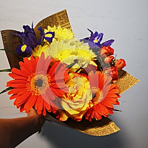 Bouquet of beautiful yellow, oramge and violet flowers