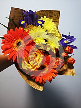 Bouquet of beautiful yellow, oramge and violet flowers