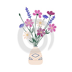 Bouquet of blooming meadow flowers in ceramic vase. Floristic composition of daisy, lavender and cosmos plants. Spring