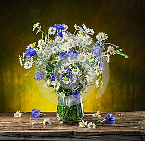 Bouquet of chamomiles and cornflowers.