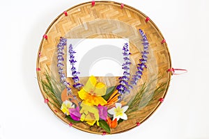 Bouquet of colorful flowers on threshing basket