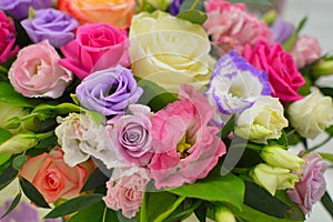 Bouquet of colorful flowers in vintage hat box