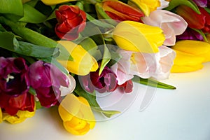 A bouquet of colorful tulips. beautiful spring flowers. background for decoration for the Easter holiday.