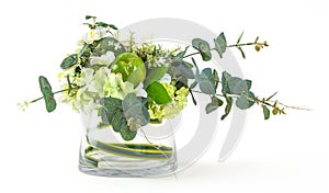 Bouquet of cosmos and eucalyptus in glass vase