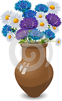 Bouquet of daisies and cornflowers in clay pot