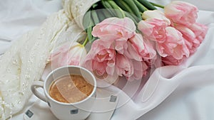 A bouquet of delicate rose tulips. A cup of aromatic coffee. 8 merta or mothers day card