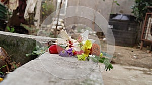 Bouquet with different flowers on a borde photo