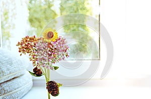 Bouquet of dried flowers, herbarium on a white light background. Beautiful yellow flowers of garden chamomile. Flowers in a crunch