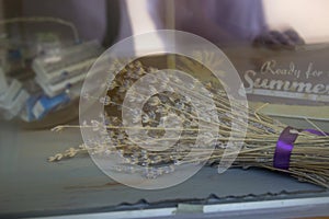 A bouquet of dry lavender on a shop window