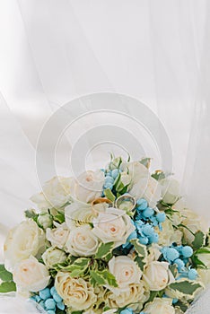 Bouquet of flowers. The bride's bouquet. Bridal bouquet. Floristics. Wedding rings