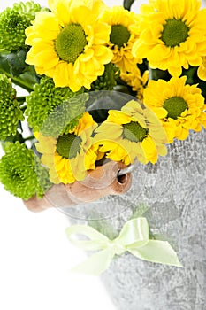 Bouquet of flowers in bucket