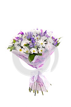 Bouquet of flowers from chamomiles and irises