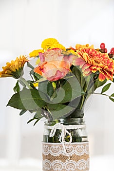 Bouquet of flowers in a creative gift vase