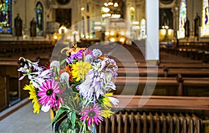Bouquet of flowers inside the Church o Sainte-Famille in Cap Sante, Quebec photo