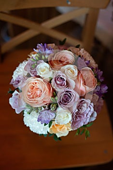 Bouquet of flowers on a leg in the interior of the restaurant for a celebration shop floristry or wedding salon