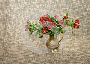 Bouquet of flowers in metal vase