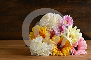 bouquet of flowers on a wood table