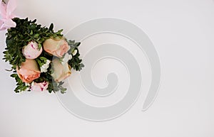 bouquet of fresh flowers on a white background with space for text photo