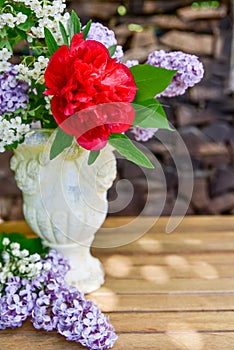 Bouquet with lilac peony roses