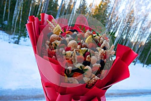 A bouquet made of nuts. Creative walnut bouquet.