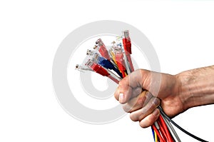 computer network cables in the hands isolated on the white background