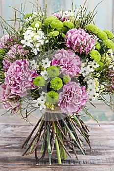 Bouquet of pink carnation, arabian star flower (ornithogalum ara