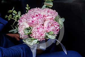 Bouquet of pink peony. The concept is a holiday, a wedding, marr