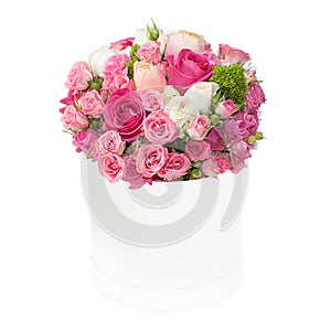 Bouquet of pink roses in the box isolated on white background