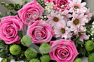 bouquet of Pink roses, chrysanthemums, florists daisy and gypsophila